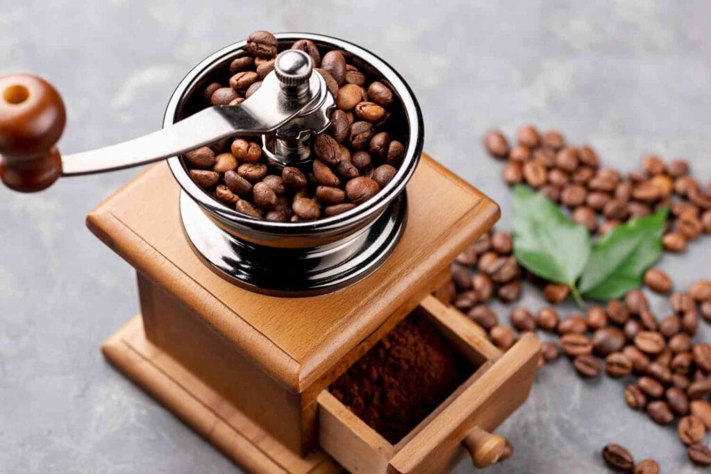 coffee grinder with coffee beans inside